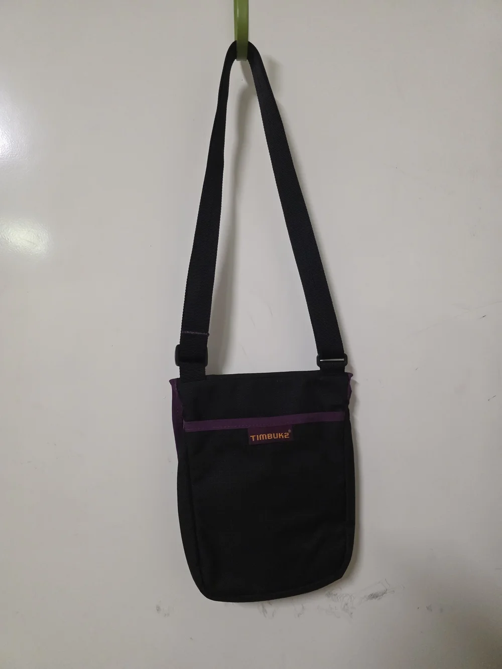 Timbuk2 Black Messenger Bag with Purple Trim and Orange Logo